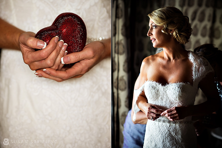 Tony and Doree's Little Palm Island wedding captures a beautiful moment as the bride tenderly holds a heart in her hands.