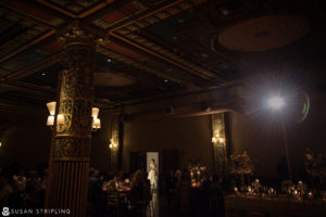 A dreamy wedding reception in an ornate ballroom in NYC, New York.