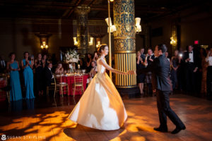 A bride and groom sharing their first dance at a wedding reception in NYC, New York.