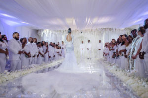 Gucci Mane and Keyshia Ka'oir Wedding Pictures: A beautiful bride walks down the aisle in a white gown.