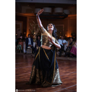 An Indian woman performing a dance at a New Jersey wedding reception.