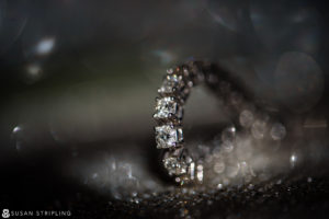A close up of a diamond ring at a wedding at Current Chelsea Piers.