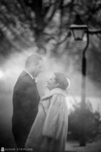 A black and white photo of a bride and groom in Philadelphia park.