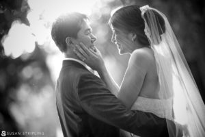 A stunning black and white photo capturing the beautiful moments of a bride and groom, taken by an exceptional Canon Explorer of Light.