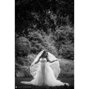 Black and white photo of an Indian bride in a wedding dress at Tarrytown House Estate.