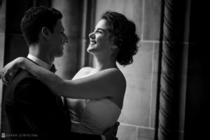 A summer bride and groom hugging in a black and white photo at Cipriani 42nd Street.