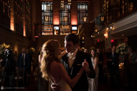 A bride and groom sharing their first dance at a wedding reception at Union Trust in Philadelphia.