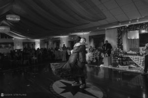 A bride and groom sharing their first dance at a wedding at Flowerfield Celebrations.