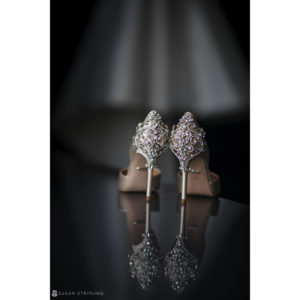 A stunning pair of wedding shoes adorned with sparkling rhinestones, perfect for a romantic Philadelphia wedding at the elegant Loews Hotel.