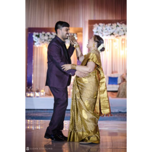 An Indian couple dancing at their wedding reception at Ocean Place Resort.