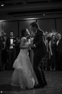 A bride and groom sharing their first dance at a wedding reception at Pier Sixty.