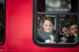 A group of children on a bus.