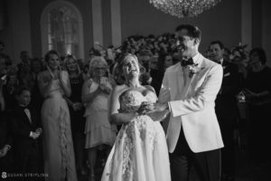 A bride and groom dance at their Wedding at the Berkeley Oceanfront Hotel in a black and white photo.