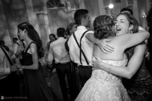 A bride and groom, captured during their heartfelt embrace on the dance floor at their Wedding at the Berkeley Oceanfront Hotel.