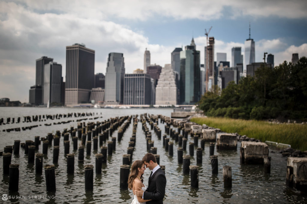 wedding picture with pylons brooklyn waterfront near 1 hotel brooklyn bridge