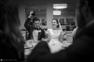 A bride and groom toasting at their wedding reception at the Westin in Philadelphia.