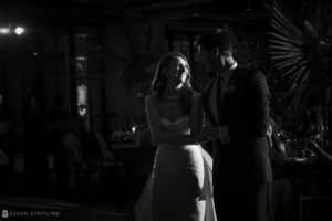 A bride and groom sharing their first dance at a 1 Hotel Brooklyn Bridge wedding.