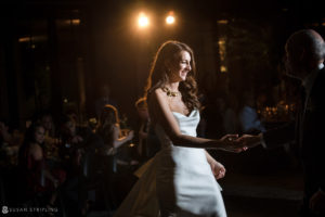 A bride and groom dancing at a Wedding reception at 1 Hotel Brooklyn Bridge.