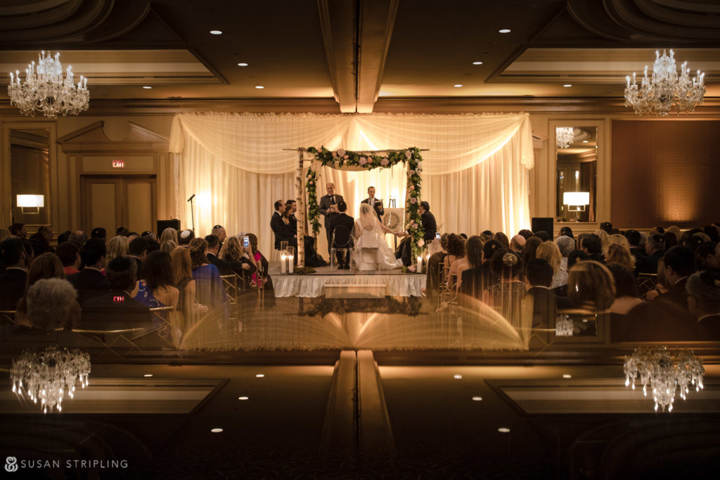 dramatic ceremony decor in philadelphia for a jewish wedding