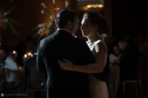 A wedding reception at the Westin in Philadelphia, where the bride and groom joyfully share their first dance.