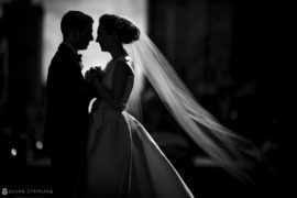 A bride and groom are silhouetted in a wedding photo at the Westin in Philadelphia.