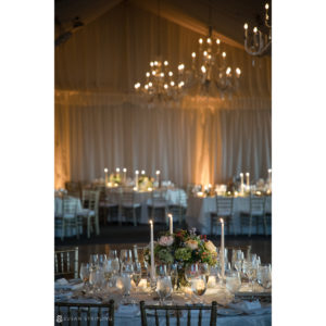 A wedding reception set up at the Sleepy Hollow Country Club with candles.