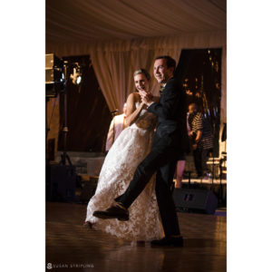 A wedding couple dancing at their Sleepy Hollow Country Club reception.