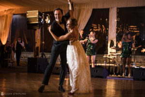 A bride and groom dancing at a Wedding reception at Sleepy Hollow Country Club.