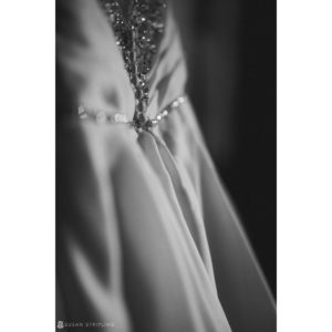 A black and white photo of a wedding dress at 501 Union.