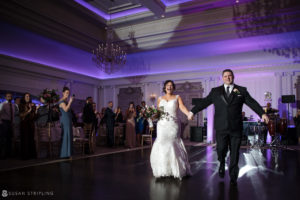 A bride and groom walking down the aisle at their Wedding at Park Chateau.