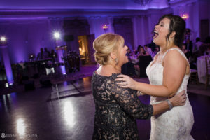 A mother and daughter dance at a wedding reception at Park Chateau.