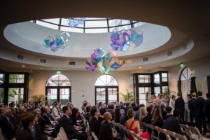 The wedding ceremony took place at the Alfond Inn, a gorgeous venue with a circular ceiling.