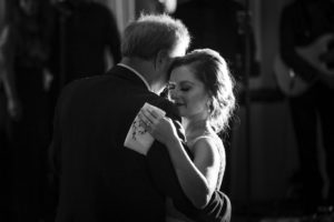 A bride and groom sharing their first dance at the Alfond Inn wedding.