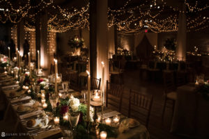 A Winter Wedding reception set up at Front and Palmer with candles and lights.