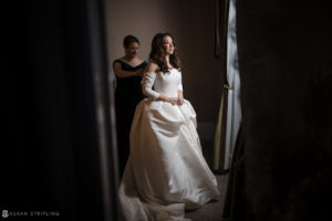 A bride is getting ready in a room at Philly's Union League for her wedding.