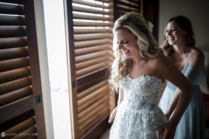 Two brides getting ready for their wedding at the Ocean Club in the Bahamas.