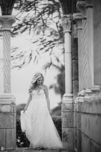 Black and white photo of a bride in a wedding dress at the Ocean Club, Bahamas.