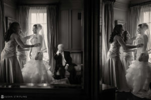 A bride is getting ready in front of a mirror during her WPPI award-winning photoshoot.