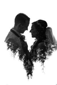A black and white photo of a bride and groom on their wedding day at Florentine Gardens estate.