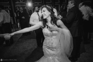 A wedding reception at Florentine Gardens estate, with the bride and groom dancing.