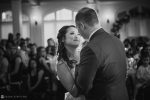 A wedding couple sharing their first dance at Whitby Castle.