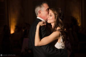 The newlyweds share their first dance at a luxurious wedding reception held at The Ritz Carlton in Philadelphia.