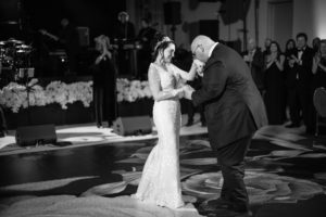A bride and groom sharing their first dance at a Four Seasons Hotel Philadelphia at Comcast Center wedding.