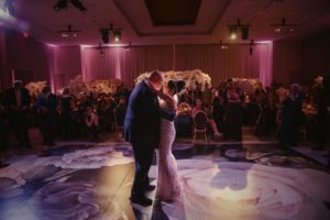 A bride and groom share their first dance at a Four Seasons Hotel Philadelphia at Comcast Center wedding reception.