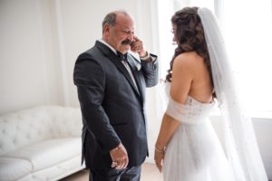 A bride and her father discussing wedding plans at the Estate at Florentine Gardens.