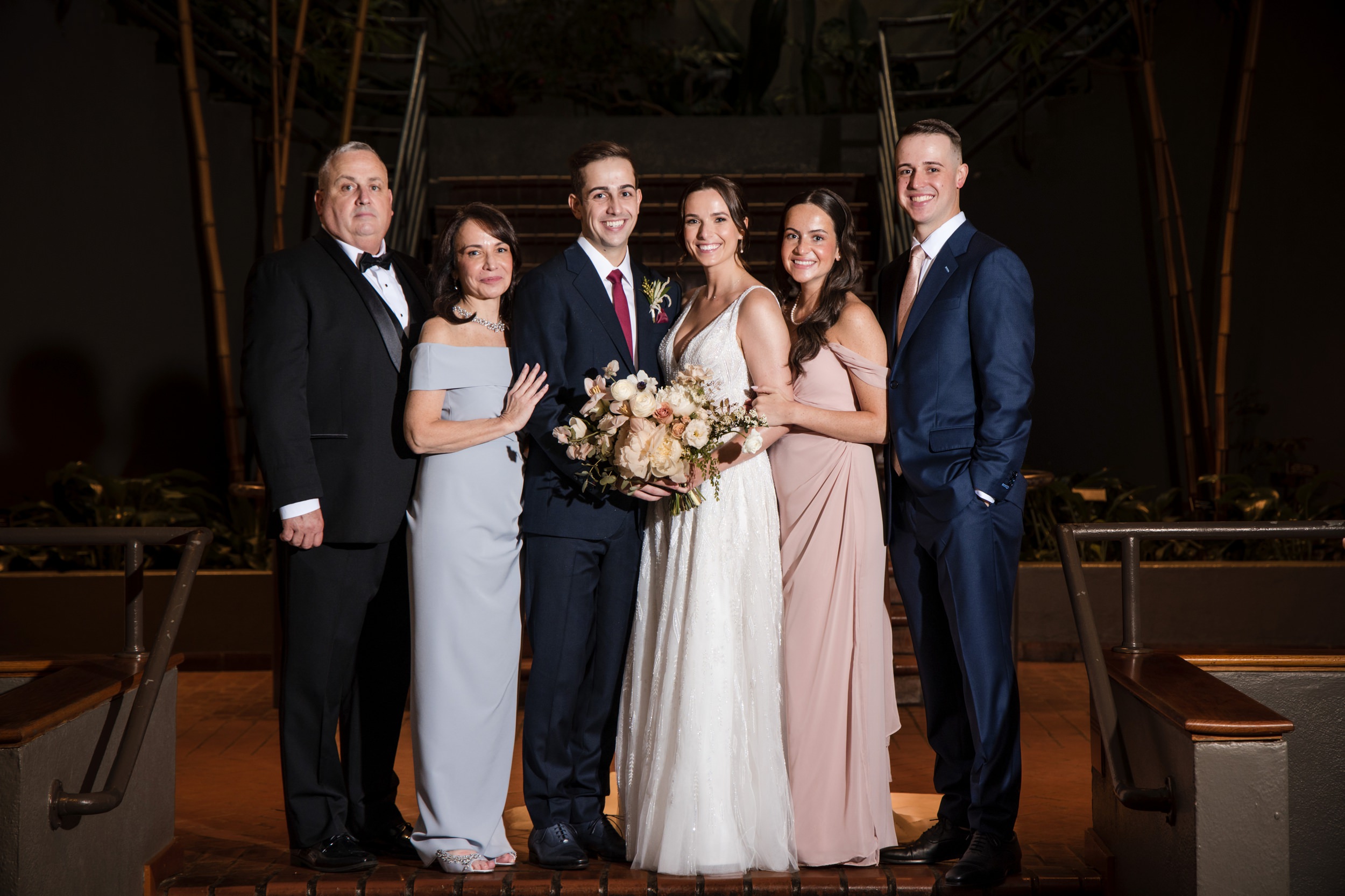 Family photos indoors at a Brooklyn botanic gardens wedding