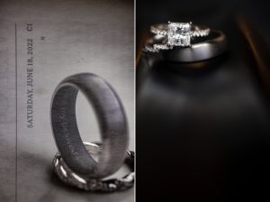 A wedding ceremony at Bourne Mansion featuring a black wedding ring and a white wedding ring, held during the summer season.