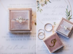 A wedding ring and engagement ring in a Wallace and the Loeb Boathouse box.