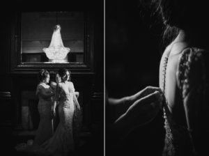 A bride is getting ready in front of a mirror in Capitale, a dark room.