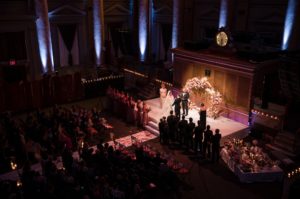 A wedding ceremony at Capitale, a large room in NYC, with enchanting lights.